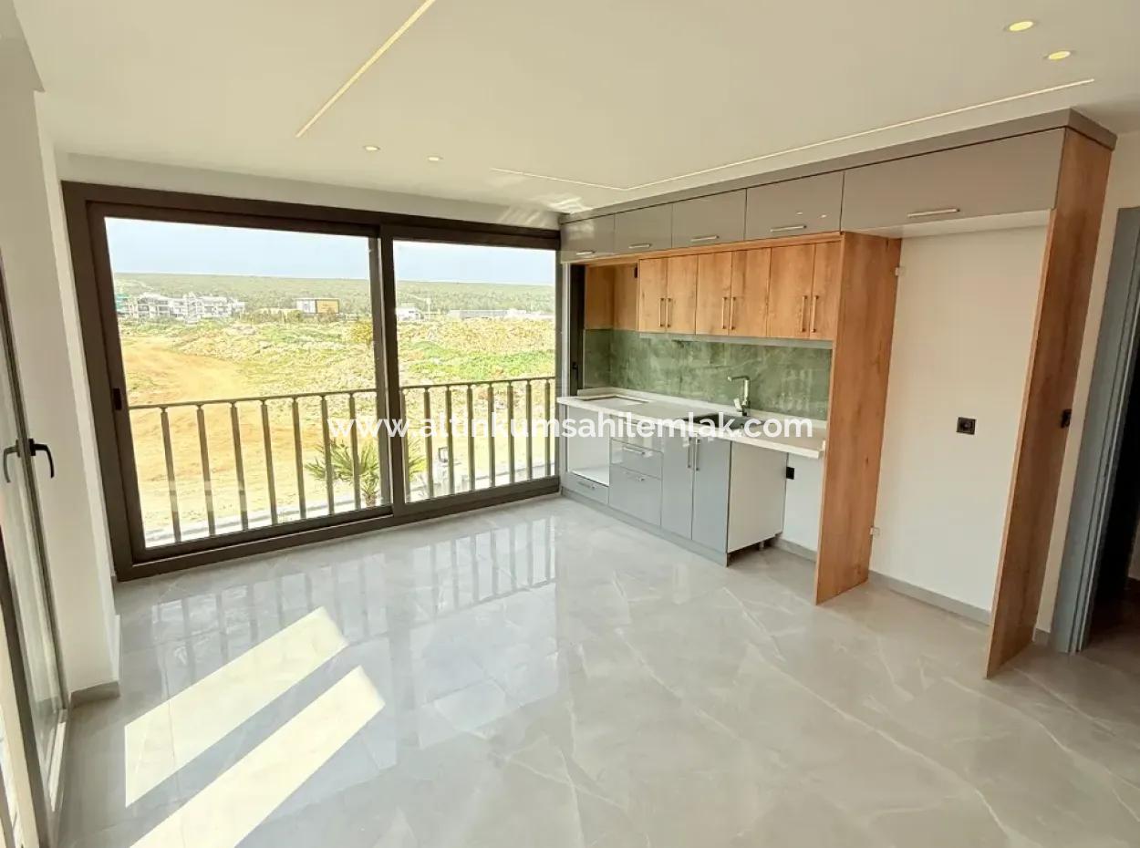 Didim Cumhuriyet Mahallesi’nde Satılık Havuzlu Site’de 2+1 Sıfır Geniş Daire