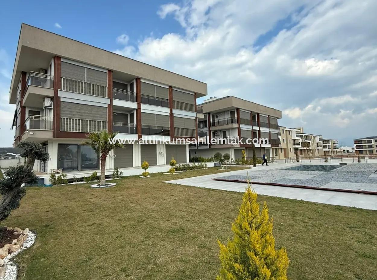 Didim Cumhuriyet Mahallesi’nde Satılık Havuzlu Site’de 2+1 Sıfır Geniş Daire