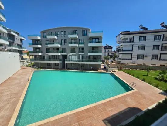 Didim Altınkum’da Havuzlu Sitede, Asansörlü Binada Köşe Konumlu 2+1 Daire