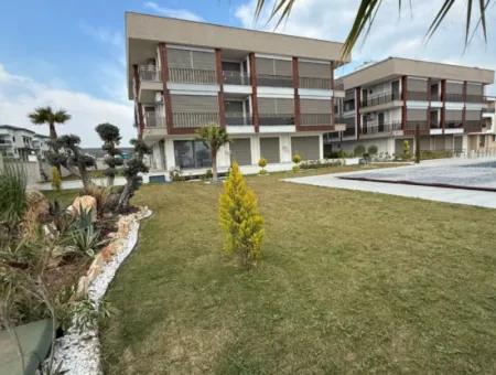 Didim Cumhuriyet Mahallesi’nde Satılık Havuzlu Site’de 2+1 Sıfır Geniş Daire